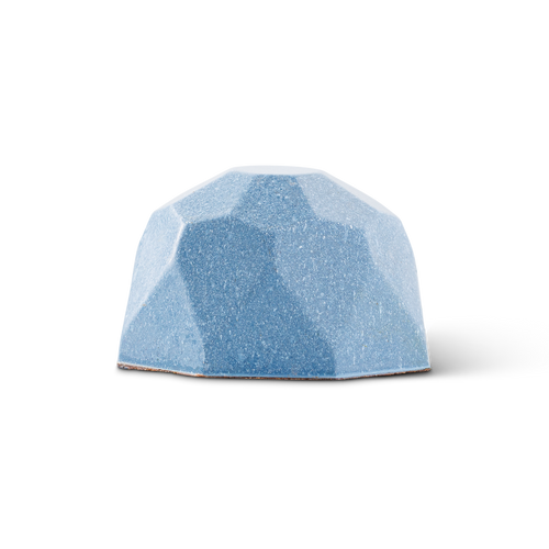 A small faceted dome-shaped object in light blue with a speckled texture, centered on a plain white background.